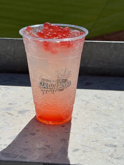 From First Pitch to Last Sip: Dirty Sodas at the Ballpark Picture of mixed drink with popping boba on top
